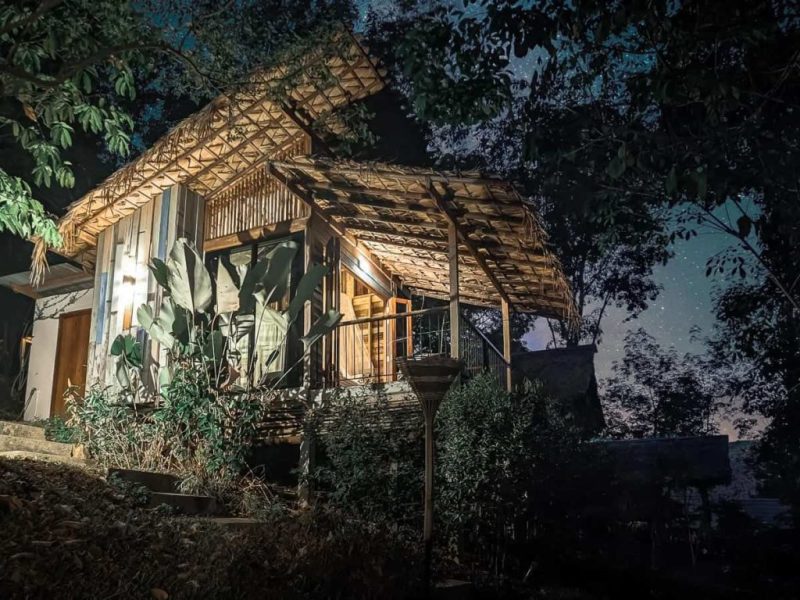 Deluxe triple room outside night garden sky